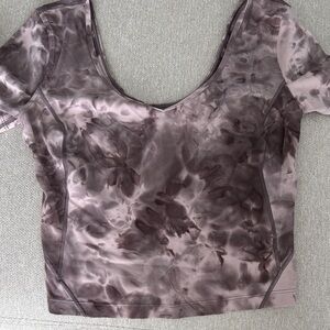 Lululemon cropped workout top.